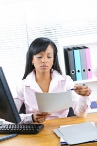 Black businesswoman working at desk